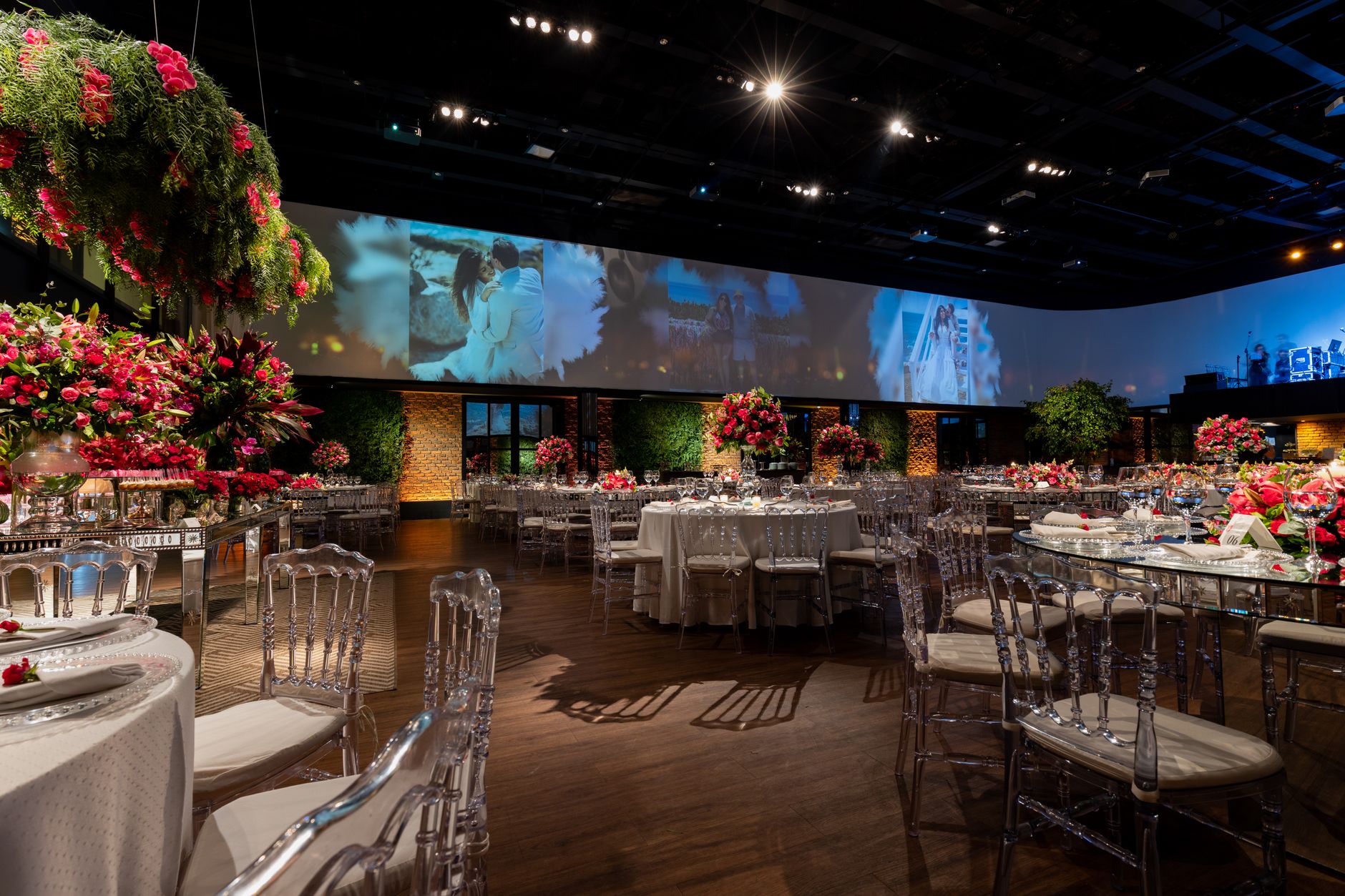 Lavish banquet hall set up for a wedding reception with beautifully adorned tables and chairs